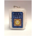 Tiny Universal Waite Tarot packaging with a face design on a white background