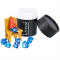 Blue dice with white numbers on a chair next to a black container labeled 'LYNX'.