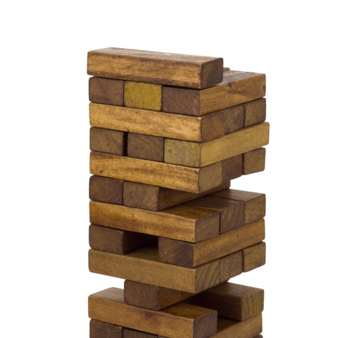 Wooden block tower game on a white background