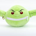 Green plush toy with a zipper on a white background