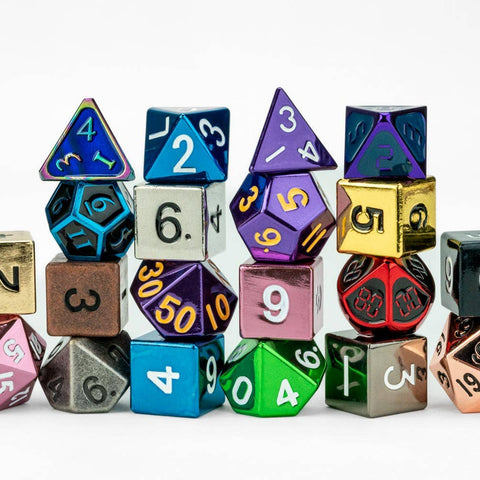 Assorted metal dice set on a white background