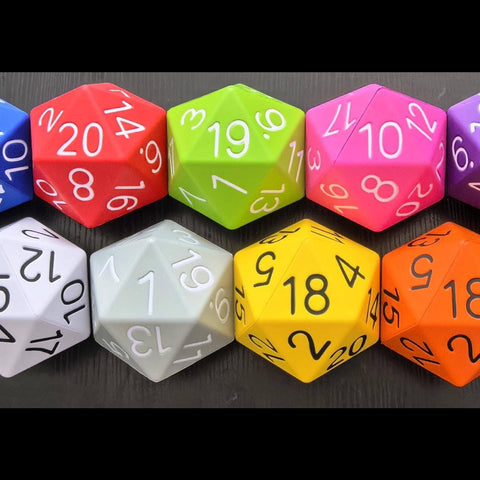 Collection of colorful polyhedral dice on a dark background