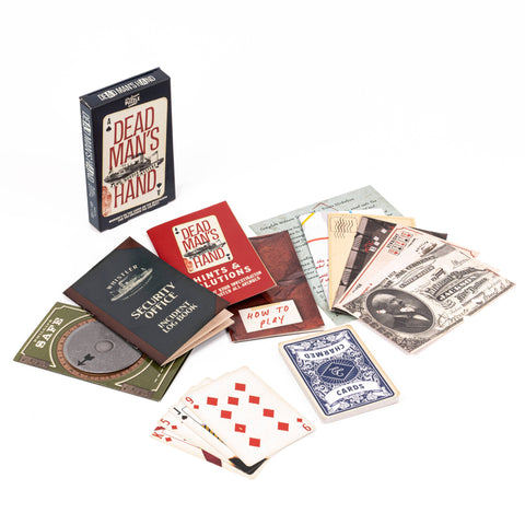Collection of playing cards and game components on a white background