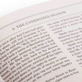 Open book with text on a white background