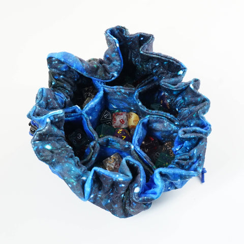 Blue Dice bag with textured surface on a white background