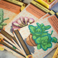 Collection of plant-themed cards with colorful illustrations on a textured surface.