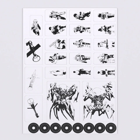 Sheet of black and white temporary tattoos on a white background