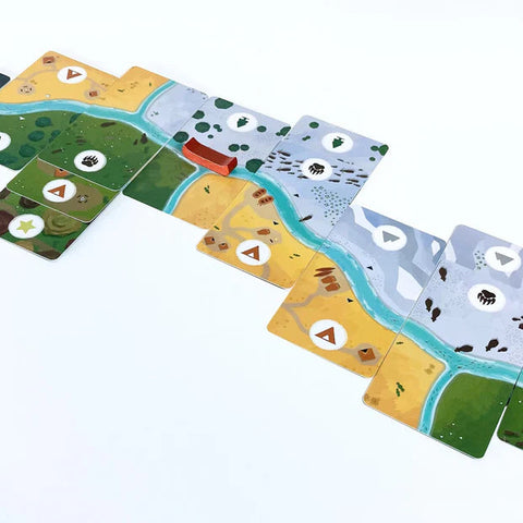 Set of colorful game board pieces on a white background