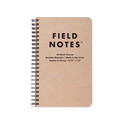 Field Notes notebook with brown cover and black text on a white background