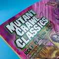 Role-playing game box titled 'Mutant Crawl Classics' against a blue sky background