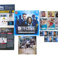 Detective: A Modern Crime Scene Game Season One board game set displayed on a white background, including the main blue box, instruction booklet, character cards, evidence cards, and dice.