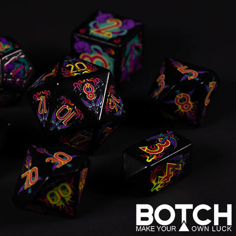 Colorful dice set with glowing numbers on a black background, featuring the brand 'BOTCH'.