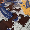 Jigsaw puzzle pieces with a map design on a wooden surface
