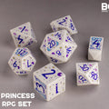 Set of seven dice with 'Magic Princess' design on a gray background, featuring the brand 'BOTCH'.
