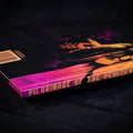 Book titled 'Pilgrimage of the Penitent' with a colorful cover on a dark background