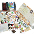 Board game components including cards, maps, and pieces on a white background