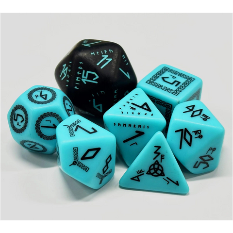 Set of turquoise and black polyhedral dice on a white background