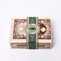 Wooden box with decorative design on a white background