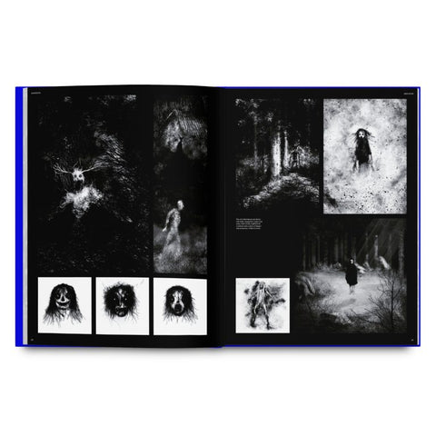 Open book displaying black and white photographs of nature and figures in a forest setting.