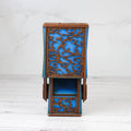 Wooden nightstand with blue interior on a white background
