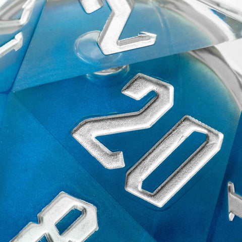Close-up of a blue polyhedral dice with silver numbers