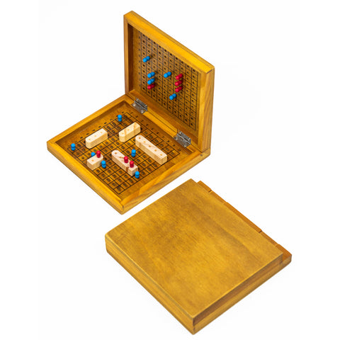 Wooden game set with pieces on a white background