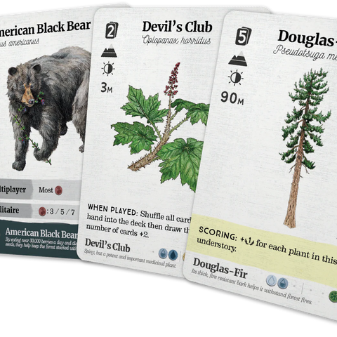 Three card game cards featuring different plants and animals on a white background